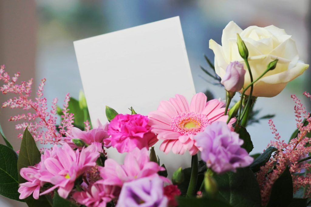 pet-safe plants, different color of flowers with a note // Healthier Me Today