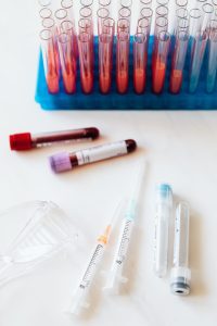 voiles of blood, white table, needles and plastic // Healthier Pets Today