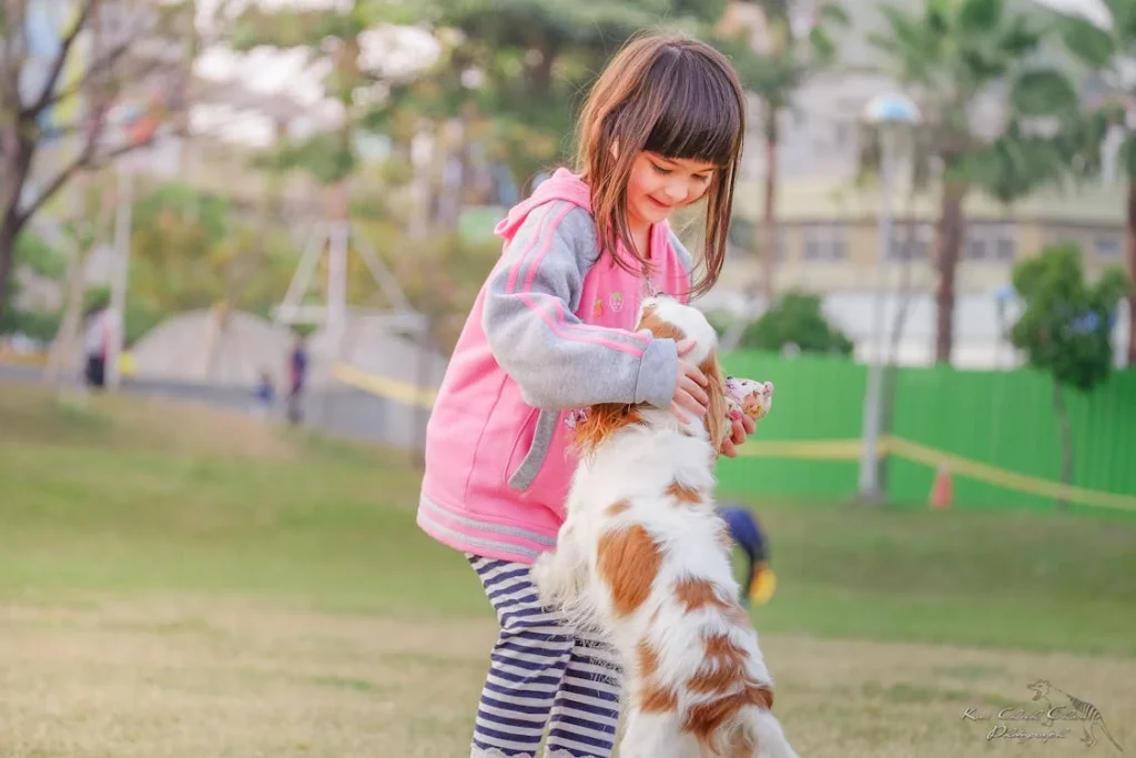 Portrait of a Smiling Young Woman With Dog // Healthier Pets Today